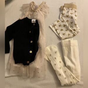 Assorted dressy baby clothes and accessories. Dressy, shiny, elegant baby girl.
